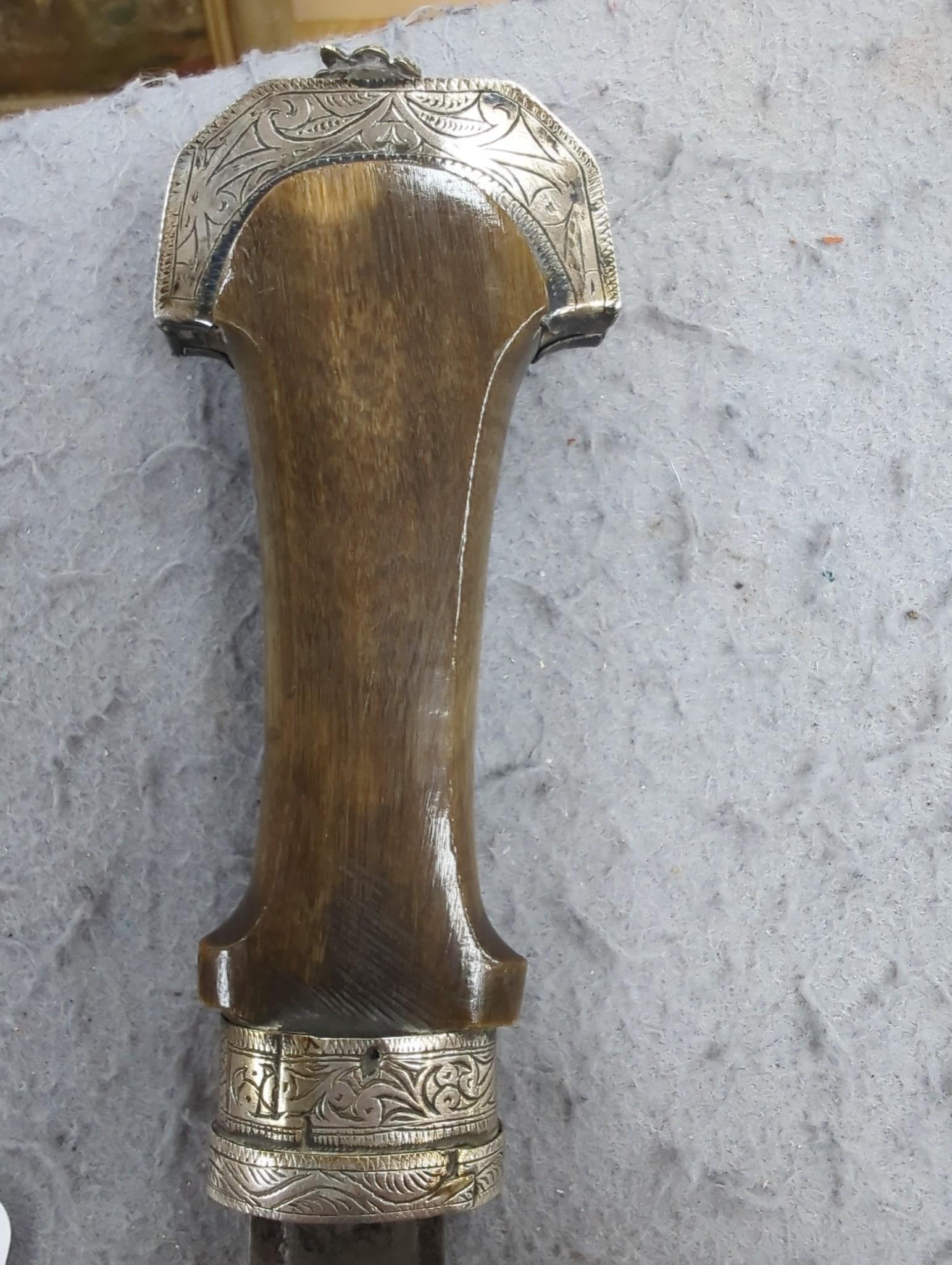 An Eastern white metal mounted dagger, a quantity of Eastern metalware and a white metal-mounted cup